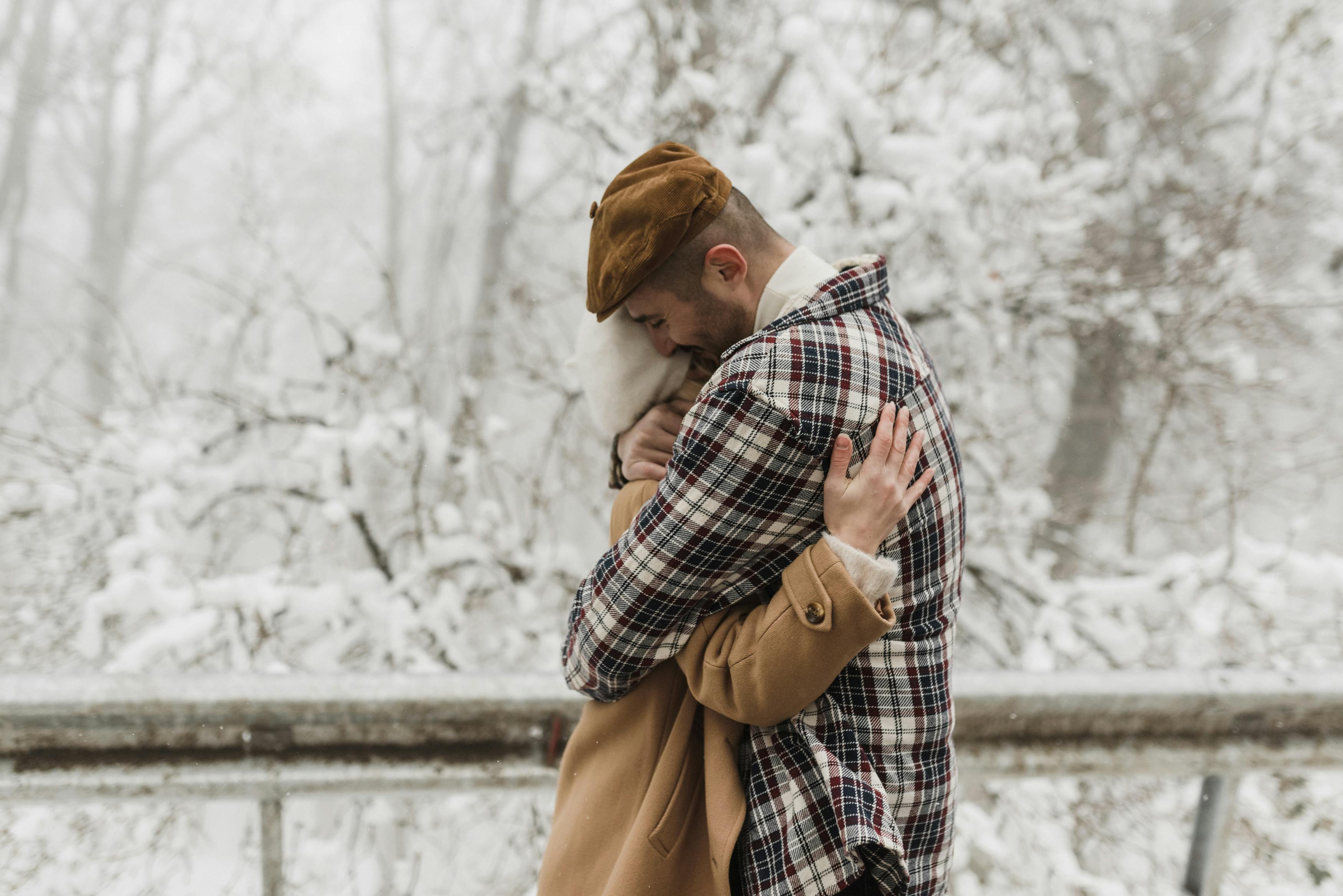 Couple hugging cares away...