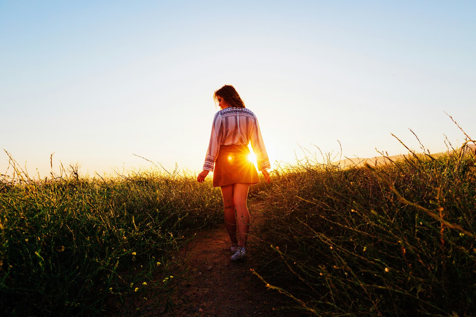 woman walking in a field